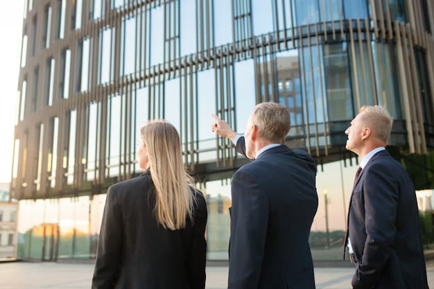 A photograph of federal employees returning to work after the announcement of the budget deal. The image should convey a sense of relief and renewed purpose.