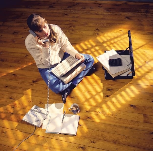 A student sitting at a desk, surrounded by college brochures and notebooks, intently researching different universities on a laptop.