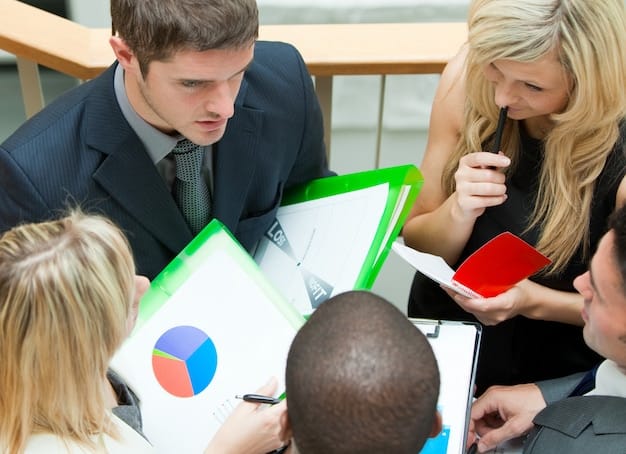 An image depicting a small business brainstorming session, with team members discussing financial strategies and tax planning. A whiteboard shows calculations and projected savings.