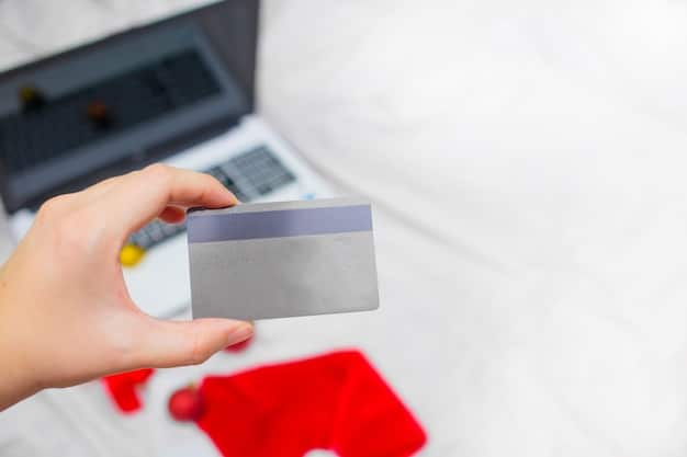 A hand holding a credit card with increasing interest rates displayed in the background, symbolizing the rising cost of debt during inflation.