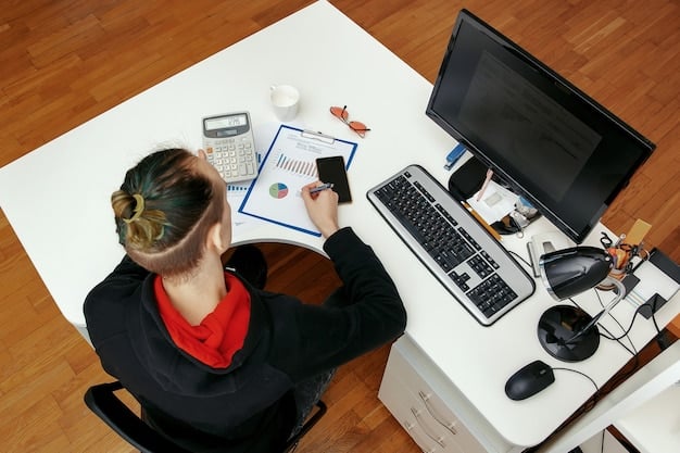 A person sitting at a desk with multiple monitors, researching salary benchmarks and industry benefits on different websites. The atmosphere conveys focused preparation and strategic planning.