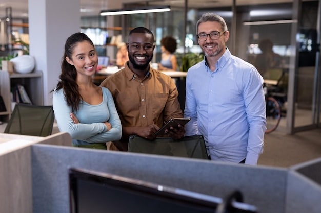 A diverse group of part-time workers smiling and working together in a modern office environment.