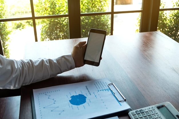 A person using a financial planning app on their smartphone, with charts and graphs displaying retirement savings projections and Social Security benefit estimates.