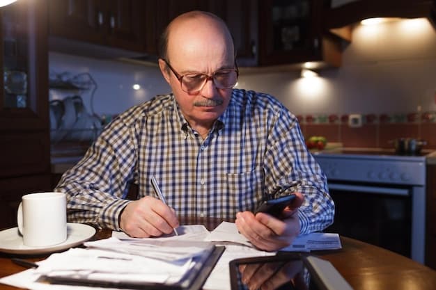 A person using a calculator and reviewing documents, with a Social Security benefits guide nearby, symbolizing the process of calculating survivor benefits.