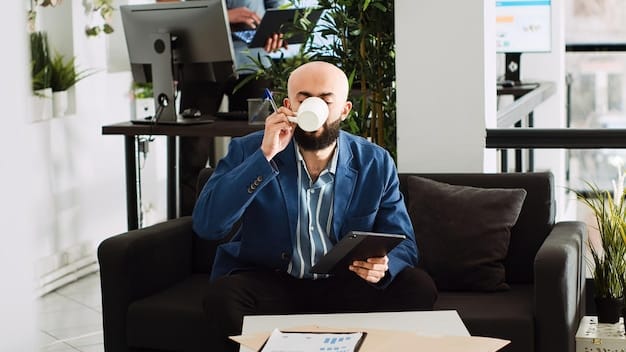 A person receiving a suspicious phone call, looking concerned while checking their Social Security card on a laptop. The scene is set in a home office environment.