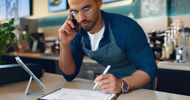 A person confidently speaking on the phone, with a notepad and financial documents in front of them, demonstrating preparation and a clear negotiation strategy.